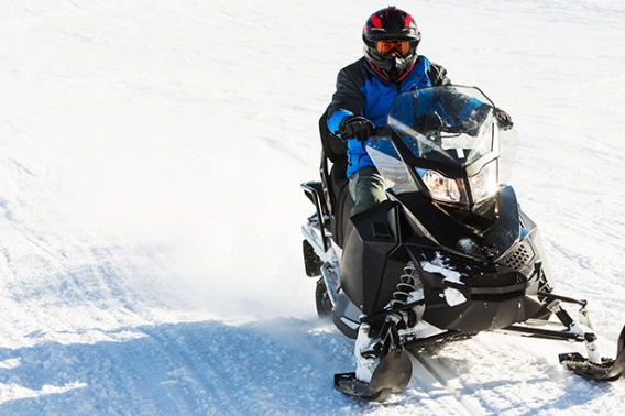 Snowmobile on frozen lake