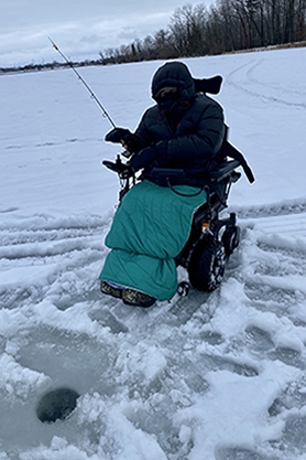 Ice fishing on a beautiful Wisconsin winter evening.